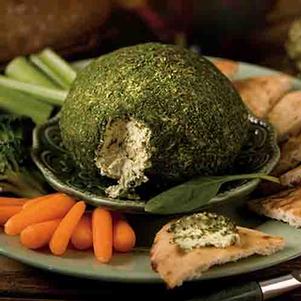 Savory Cheeseball on platter with vegetables made with Wind & Willow mix