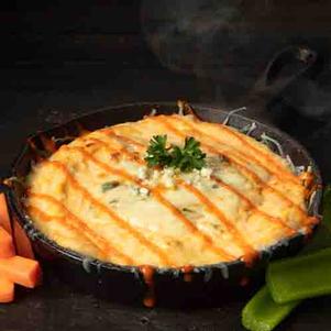 Buffalo Hot Dip in iron skillet made with Wind & Willow mix